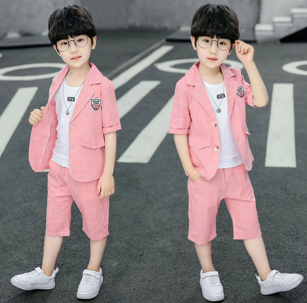 Two identical images of a child wearing a pink suit on a road.