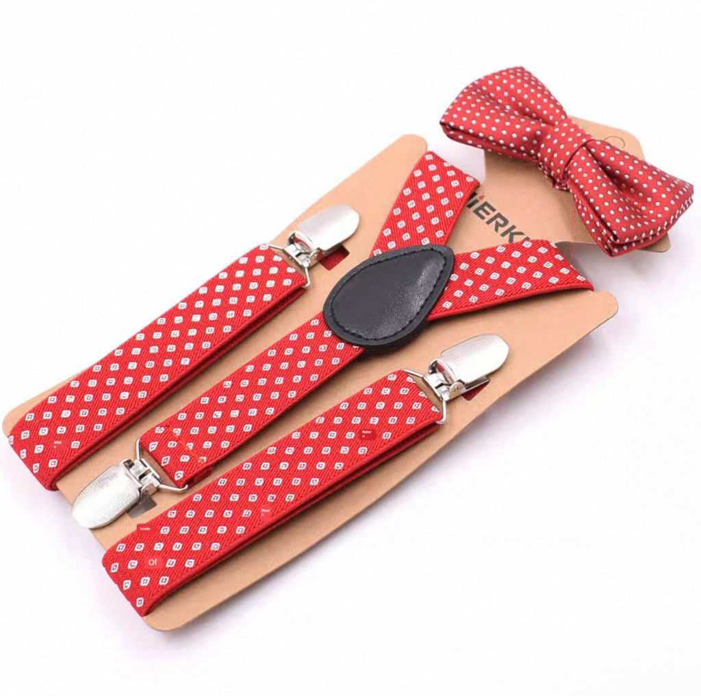 Red polka dot suspenders and bow tie set on a white background