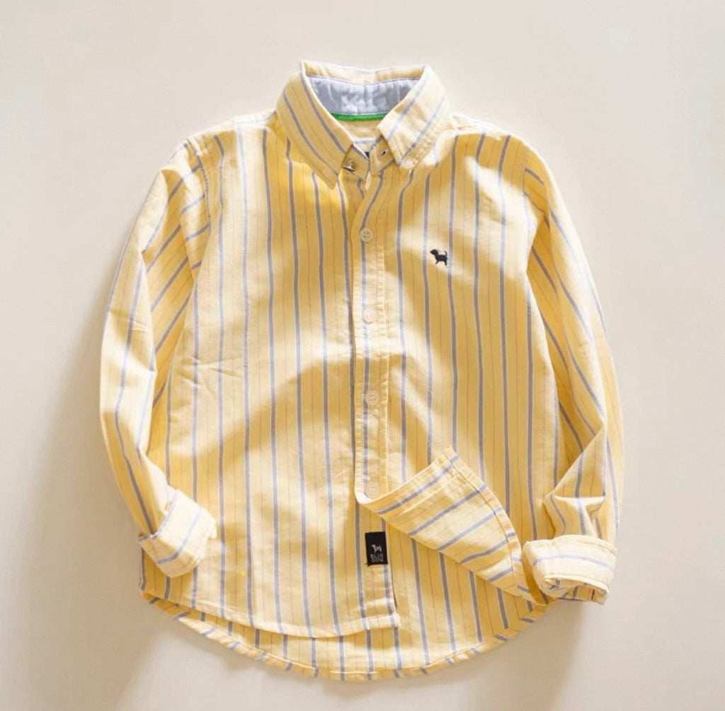 Yellow striped shirt on a beige background