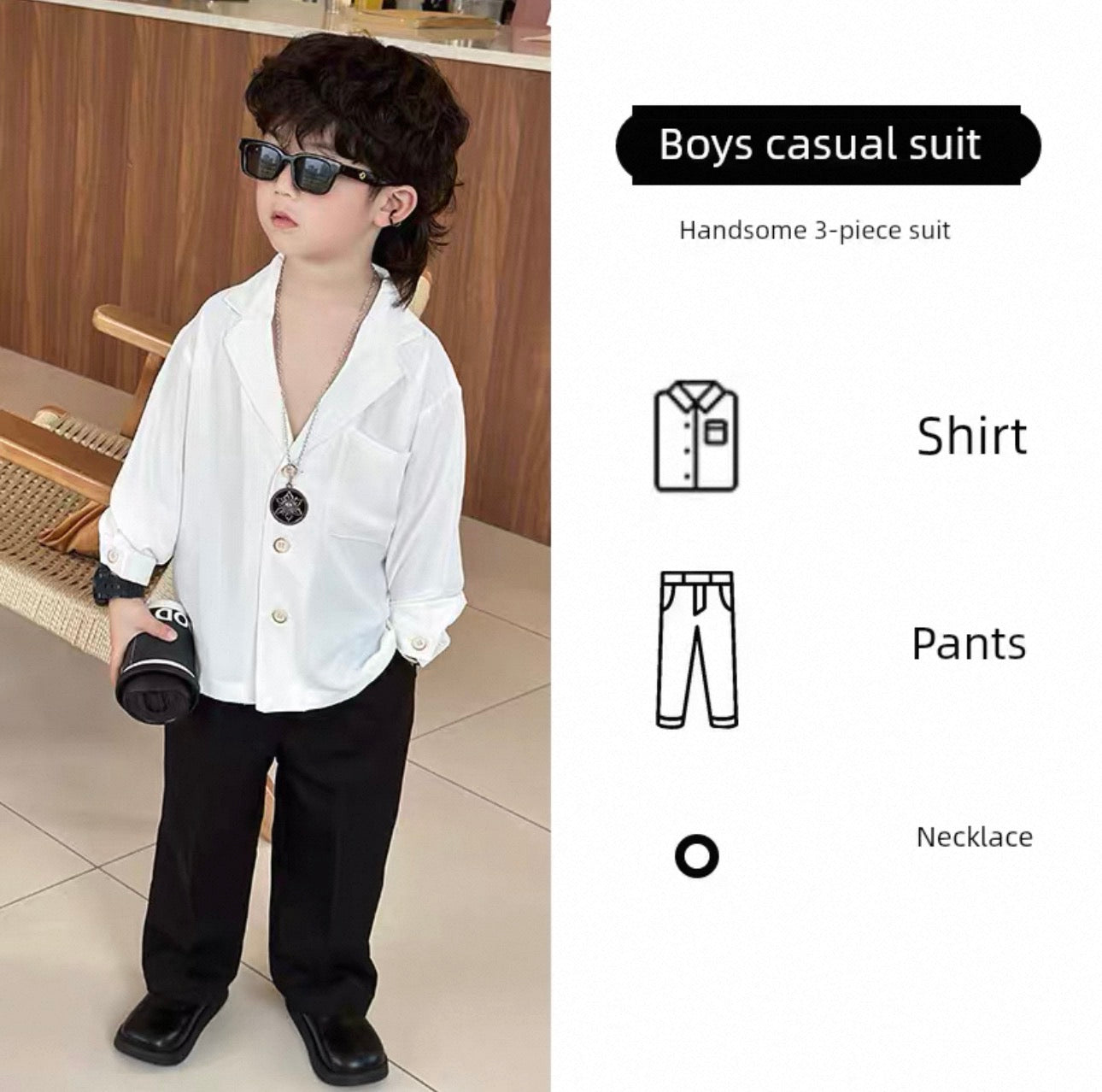 Child wearing a white shirt, black pants, and sunglasses with product details on the side.