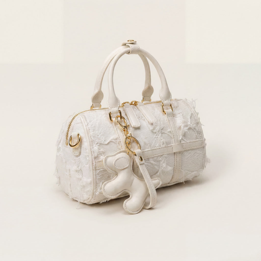 Sac Boston en cuir blanc avec pompon | Canada