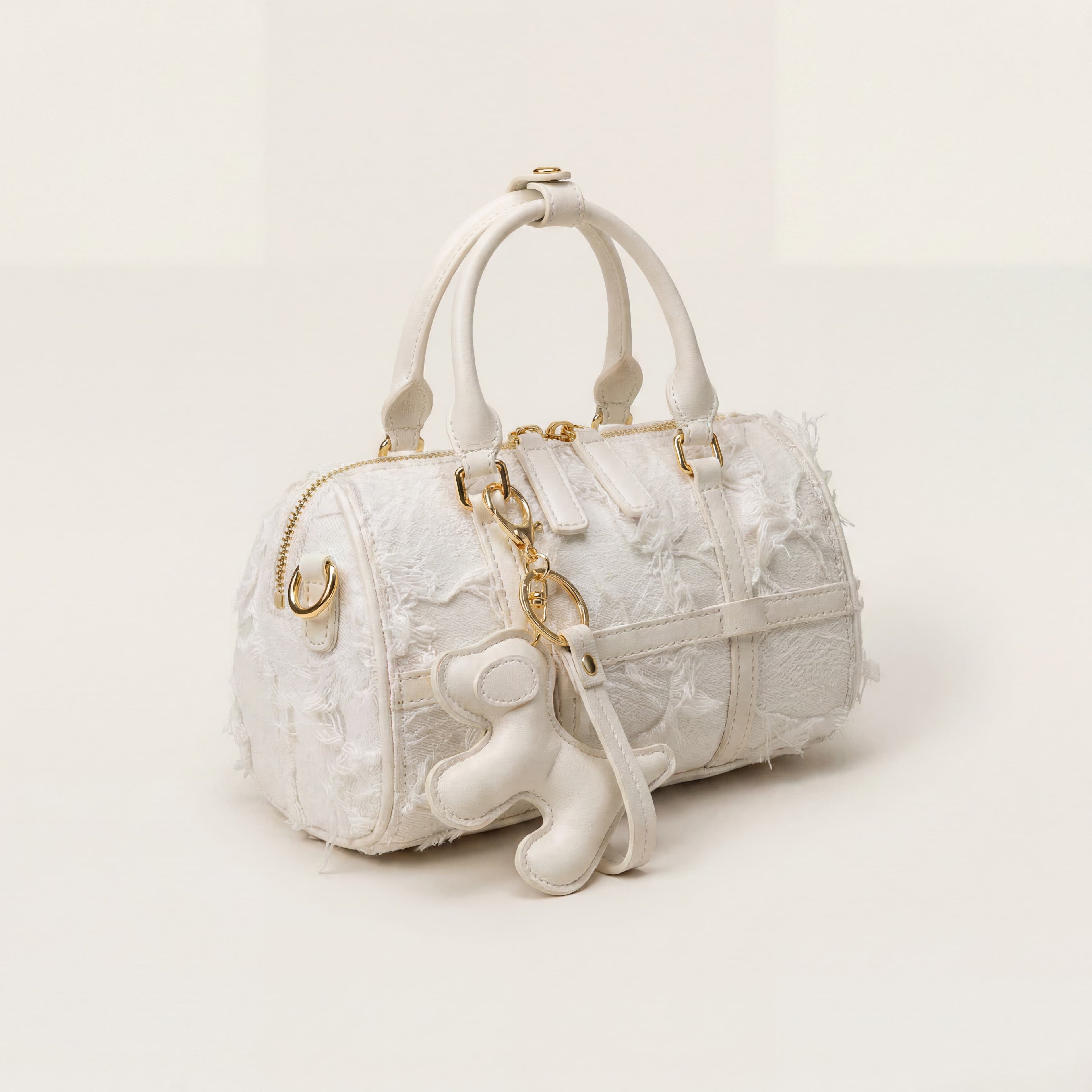 Sac Boston en cuir blanc avec pompon | Canada