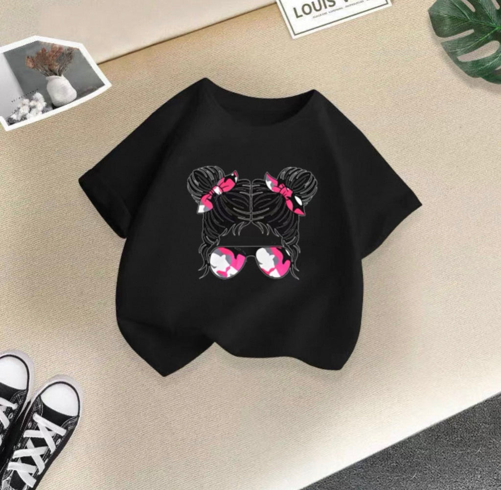 Black sweatshirt with a unique design on a beige surface