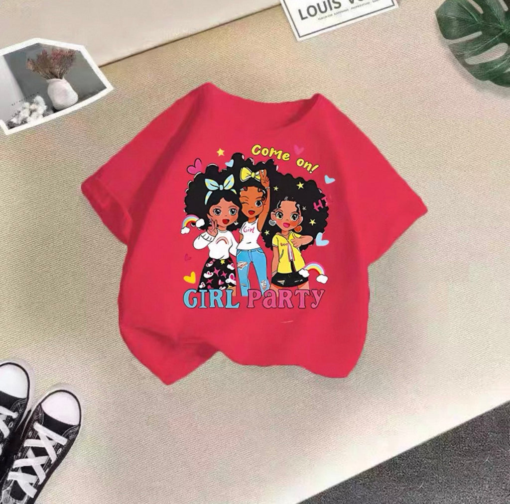 Red sweatshirt with cartoon girls and 'Girl Party' text on a beige surface.