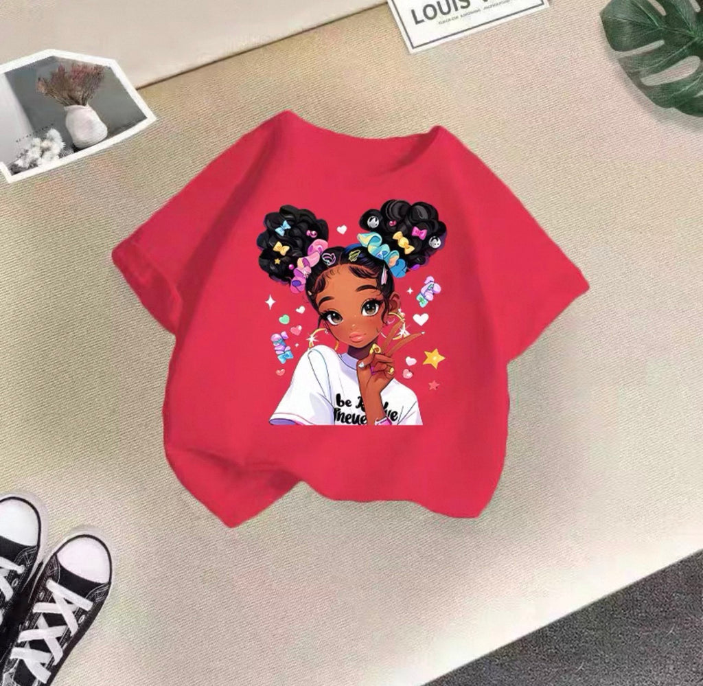 Red sweatshirt with an illustration of a girl on a beige surface