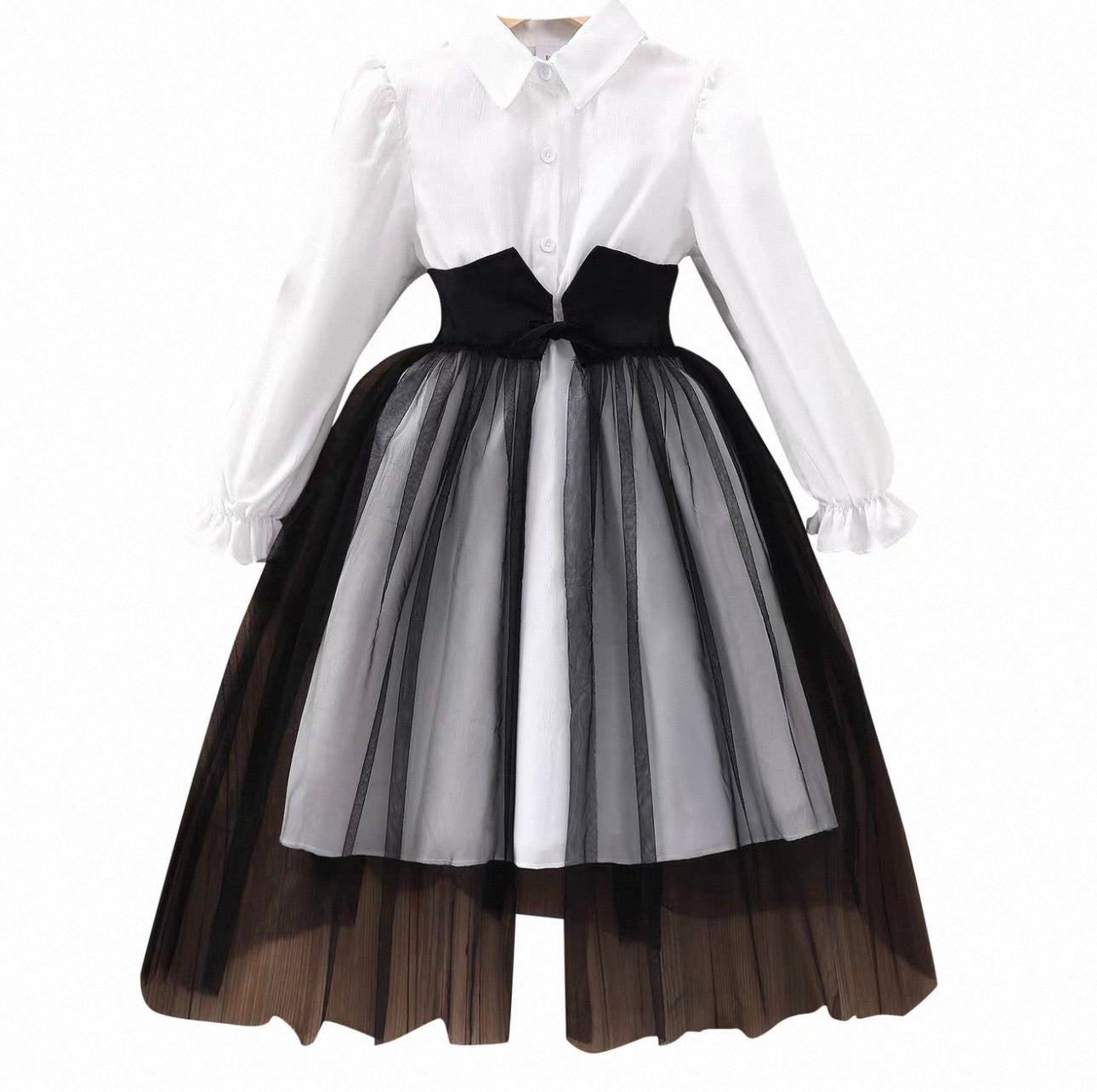 Dress with white shirt and black and white layered skirt on a white background